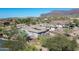 Single-story home with mountain views and desert landscaping at 4126 S Last Chance Trl, Gold Canyon, AZ 85118