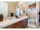 Clean bathroom with double sinks and a view into the shower at 4126 S Last Chance Trl, Gold Canyon, AZ 85118