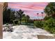 Enjoy lake views from this relaxing patio, complete with seating at 24426 S Ribbonwood Dr, Sun Lakes, AZ 85248