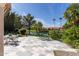 Expansive patio with lake view and seating area at 24426 S Ribbonwood Dr, Sun Lakes, AZ 85248