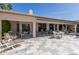 Large covered patio with seating area for relaxing at 24426 S Ribbonwood Dr, Sun Lakes, AZ 85248