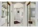 Large bathroom with double vanity, shower, and a luxurious bathtub at 24426 S Ribbonwood Dr, Sun Lakes, AZ 85248