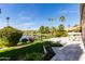 Large patio with a beautiful lake view at 24426 S Ribbonwood Dr, Sun Lakes, AZ 85248