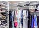 Large walk-in closet with ample shelving and hanging space at 24426 S Ribbonwood Dr, Sun Lakes, AZ 85248
