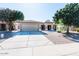 Single-story home with attached garage and landscaped yard at 2423 E Pony Ln, Gilbert, AZ 85295