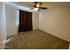 Bedroom with ceiling fan and window coverings at 14416 N Teakwood Ln # D, Fountain Hills, AZ 85268