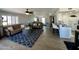 Bright living room with large mirror reflecting space at 14416 N Teakwood Ln # D, Fountain Hills, AZ 85268