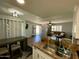 Kitchen and dining area with tile floors and updated cabinets at 14416 N Teakwood Ln # D, Fountain Hills, AZ 85268