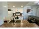 Modern kitchen with white cabinets and granite counters at 14416 N Teakwood Ln # D, Fountain Hills, AZ 85268