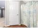 Bathroom with shower/tub and patterned shower curtain at 20293 N 83Rd Dr, Peoria, AZ 85382