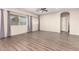 Bright living room with hardwood floors and access to backyard at 20293 N 83Rd Dr, Peoria, AZ 85382