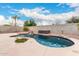 Inviting kidney shaped pool with a spa and waterfall at 20293 N 83Rd Dr, Peoria, AZ 85382