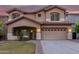 Two-story house with a large yard, two-car garage, and neutral color scheme at 20293 N 83Rd Dr, Peoria, AZ 85382