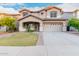 Two story home with landscaped yard and two car garage at 20293 N 83Rd Dr, Peoria, AZ 85382
