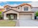 Two story home with landscaped yard and two car garage at 20293 N 83Rd Dr, Peoria, AZ 85382