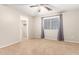Bedroom with ceiling fan and large closet at 20293 N 83Rd Dr, Peoria, AZ 85382