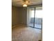 Bright bedroom with sliding door to balcony access at 4925 E Desert Cove Ave # 350, Scottsdale, AZ 85254