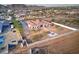 Aerial view of a house with a large backyard, patio, and mountain views at 3923 W Fox Rd, Laveen, AZ 85339
