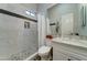 Clean bathroom with a shower, tile floors, and modern vanity at 3923 W Fox Rd, Laveen, AZ 85339