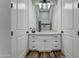 Elegant bathroom with double vanity and large mirror at 3923 W Fox Rd, Laveen, AZ 85339