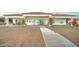 Home exterior showcasing a covered patio and walkway at 3923 W Fox Rd, Laveen, AZ 85339