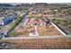Aerial view of a house with a large backyard, patio, and mountain views at 3923 W Fox Rd, Laveen, AZ 85339