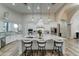 Elegant kitchen features a large island with granite countertops and white shaker cabinets at 3923 W Fox Rd, Laveen, AZ 85339