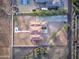 Aerial view of a house with a large backyard and mountain views at 3923 W Fox Rd, Laveen, AZ 85339