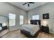 Comfortable bedroom with wood floors and plenty of natural light at 3923 W Fox Rd, Laveen, AZ 85339