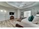 Bright main bedroom with king bed and backyard access at 3923 W Fox Rd, Laveen, AZ 85339