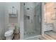 Elegant bathroom with a large glass shower, modern vanity, and updated toilet at 3923 W Fox Rd, Laveen, AZ 85339