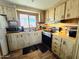 Kitchen with stainless steel appliances and wood cabinets at 318 S Crismon Rd # 64, Mesa, AZ 85208