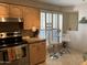 Kitchen with breakfast bar and view to outside at 5132 N 31St N Way # 134, Phoenix, AZ 85016