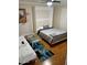 Bedroom with a Murphy bed and sofa at 5132 N 31St N Way # 134, Phoenix, AZ 85016
