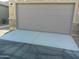 Attached two-car garage with concrete driveway at 846 N Pueblo Dr # 138, Casa Grande, AZ 85122