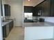Modern kitchen with stainless steel appliances and an island at 846 N Pueblo Dr # 140, Casa Grande, AZ 85122