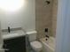 Updated bathroom with a bathtub and tiled shower surround at 846 N Pueblo Dr # 140, Casa Grande, AZ 85122
