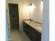 Modern bathroom with double vanity and walk-in shower at 846 N Pueblo Dr # 140, Casa Grande, AZ 85122