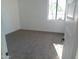 Bright bedroom with neutral carpeting and a window at 846 N Pueblo Dr # 140, Casa Grande, AZ 85122