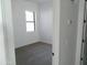 Simple bedroom with carpet and a large window at 846 N Pueblo Dr # 140, Casa Grande, AZ 85122