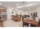 Open kitchen with island, stainless steel appliances, and ample cabinetry at 7577 S Towel Creek Dr, Gold Canyon, AZ 85118