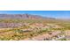 Aerial view of a residential community with mountain views at 7577 S Towel Creek Dr, Gold Canyon, AZ 85118