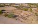 Aerial view of a ranch with several fenced-in areas at 840 S Vulture Mine Rd, Wickenburg, AZ 85390