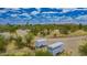 Aerial view of a home and surrounding desert landscape at 840 S Vulture Mine Rd, Wickenburg, AZ 85390