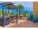 Relaxing patio with a built-in grill and mountain views at 840 S Vulture Mine Rd, Wickenburg, AZ 85390