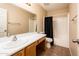 Clean bathroom with a shower/tub combo, vanity, and tile flooring at 9016 W Tony Ct, Peoria, AZ 85382