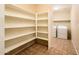 Bright and spacious pantry with numerous shelves at 9016 W Tony Ct, Peoria, AZ 85382