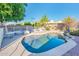 Expansive backyard with a refreshing pool and patio furniture at 9016 W Tony Ct, Peoria, AZ 85382