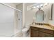 Clean bathroom with granite countertop, updated vanity, and shower at 19562 N Wikieup Ct, Surprise, AZ 85374