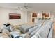 Bright living room with large TV and comfortable seating at 19562 N Wikieup Ct, Surprise, AZ 85374
